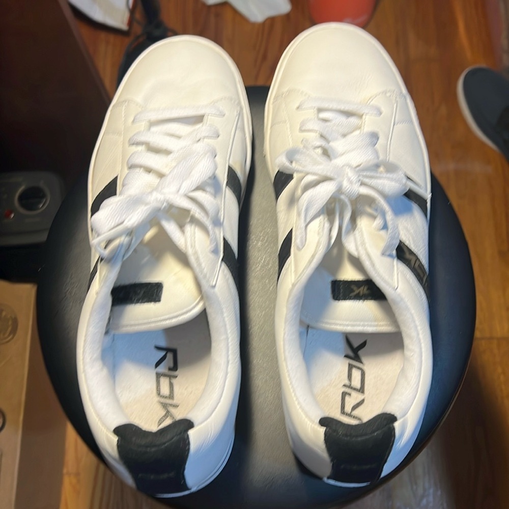 One pair RBK white and black sneakers owned a couple years and worn a few times.